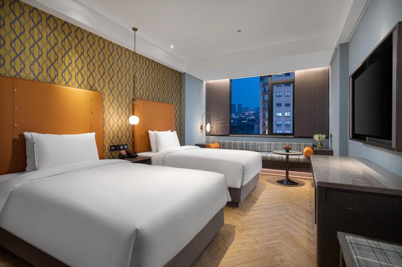 Kasion Pugis Hotel อี้วู ภายนอก รูปภาพ